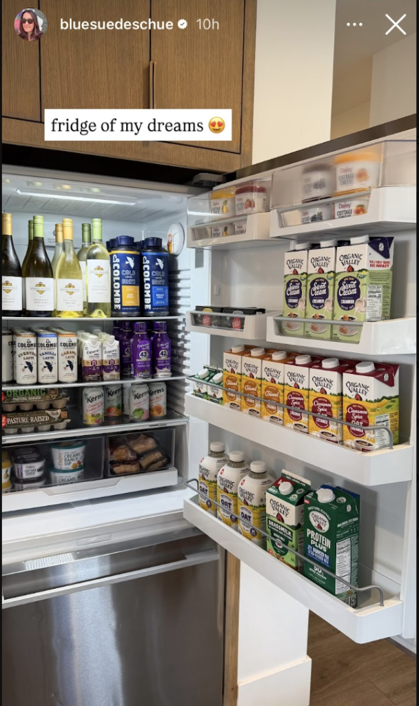 An Instagram Story from @bluesuedeschue captioned "fridge of my dreams" showing a refrigerator stocked floor-to-door with CBC PR client products including Organic Valley creamers and milks, Kern's juices, La Colombe coffees, Organic pasture-raised eggs, and Daisy cottage cheese.