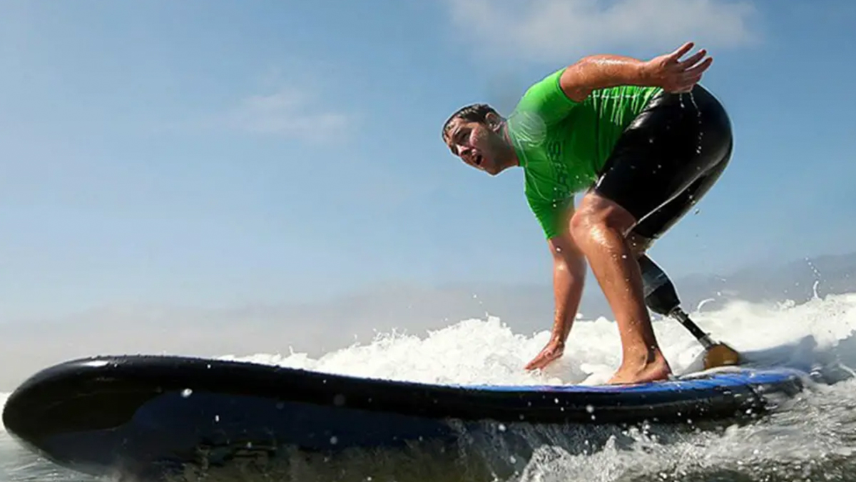 Ampsurf veteran surfing a wave