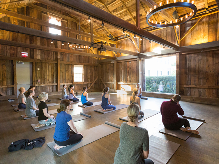 people participating in a yoga class