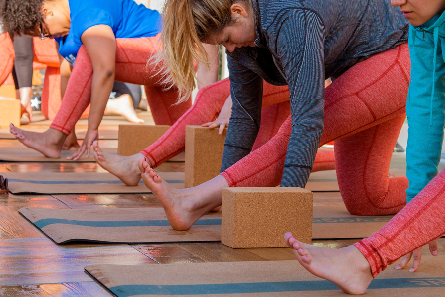 Woman doing yoga at Culinary House