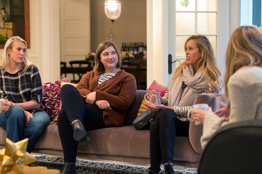 influencers and press sitting around living room at CBC Hosting House