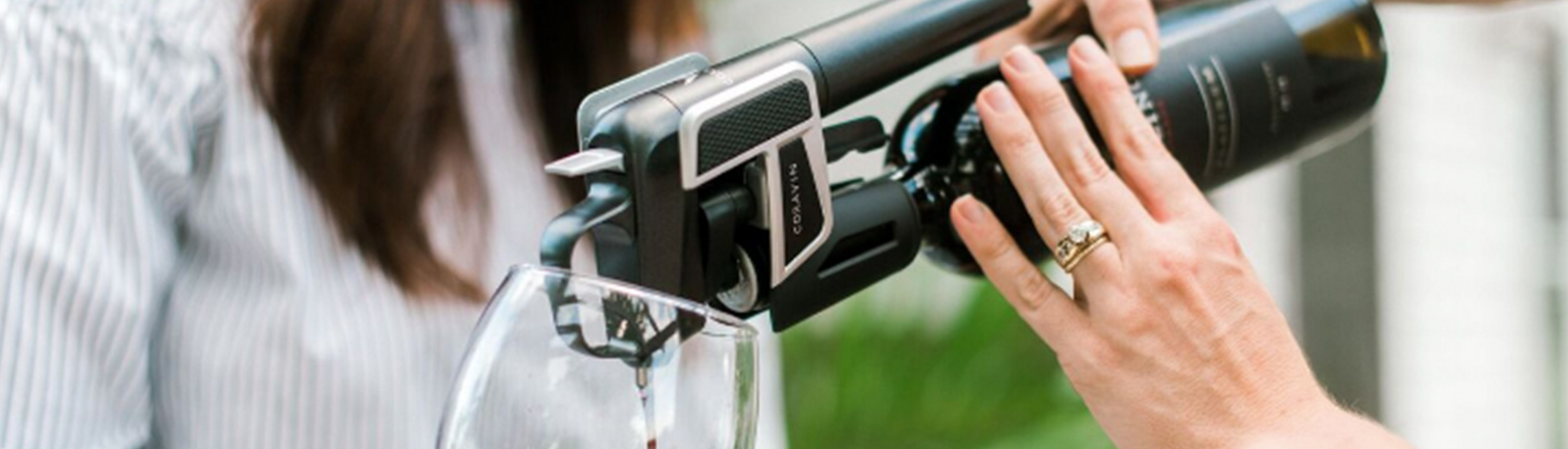 Woman pouring wine with Coravin used for social media