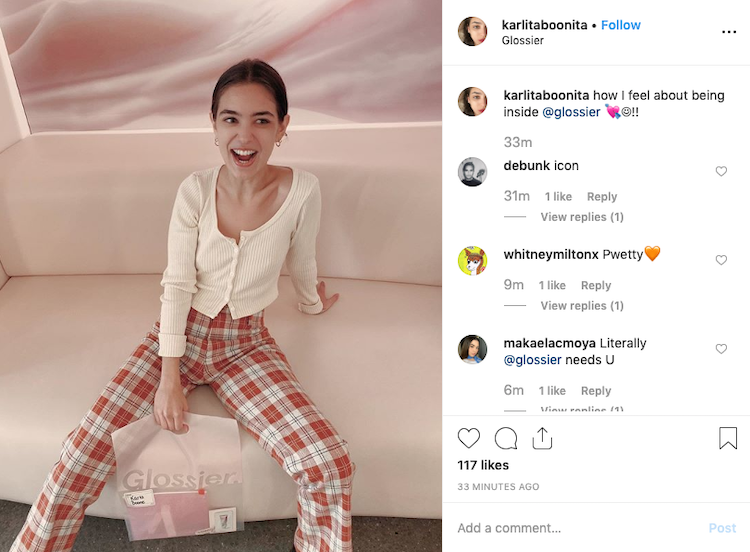 A sample Glossier Instagram post that highlights their experiential marketing strategy