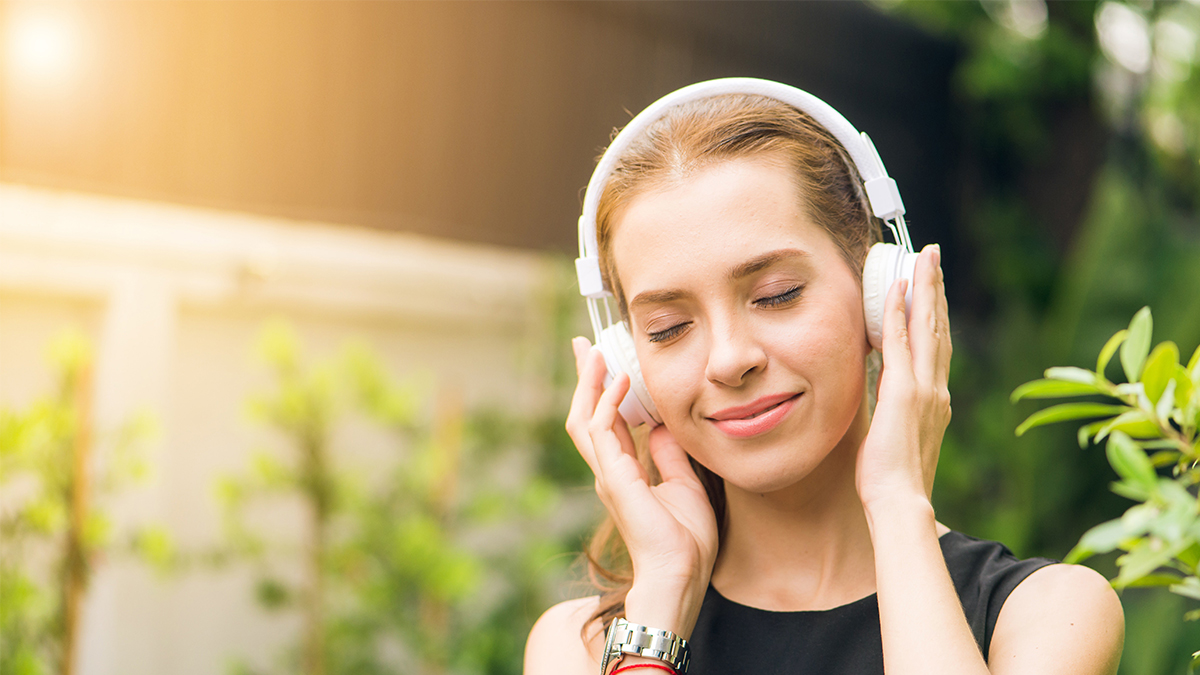 Woman listening to music from experiential program for Headspace