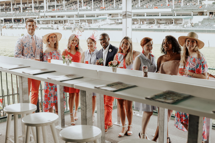 Influencers enjoying mint juleps at the Kentucky Derby Oaks Day