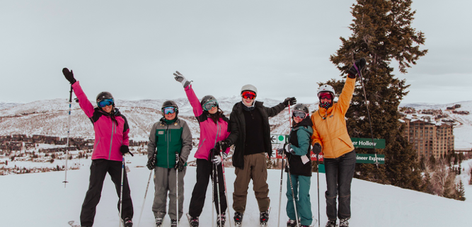 Group standing on the ski mountain at CBC Deer Valley Experience