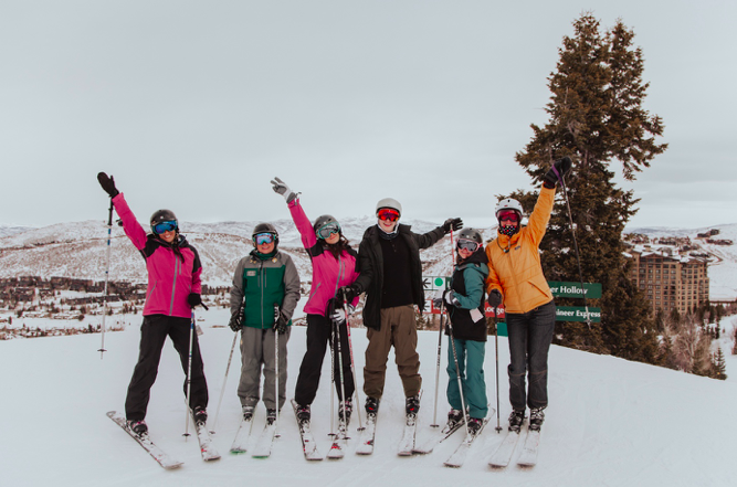 Group standing on the ski mountain