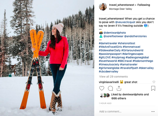 Instagram post of woman with skis