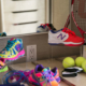 colorful children's sneakers and tennis racket